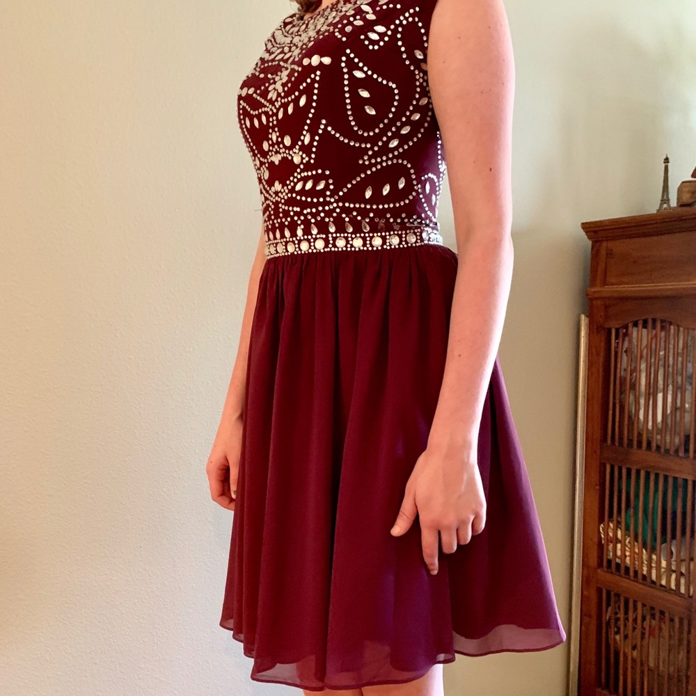 Beaded homecoming dress in purple.